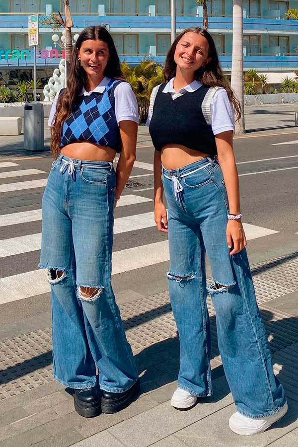 calça jeans destroyed wide leg