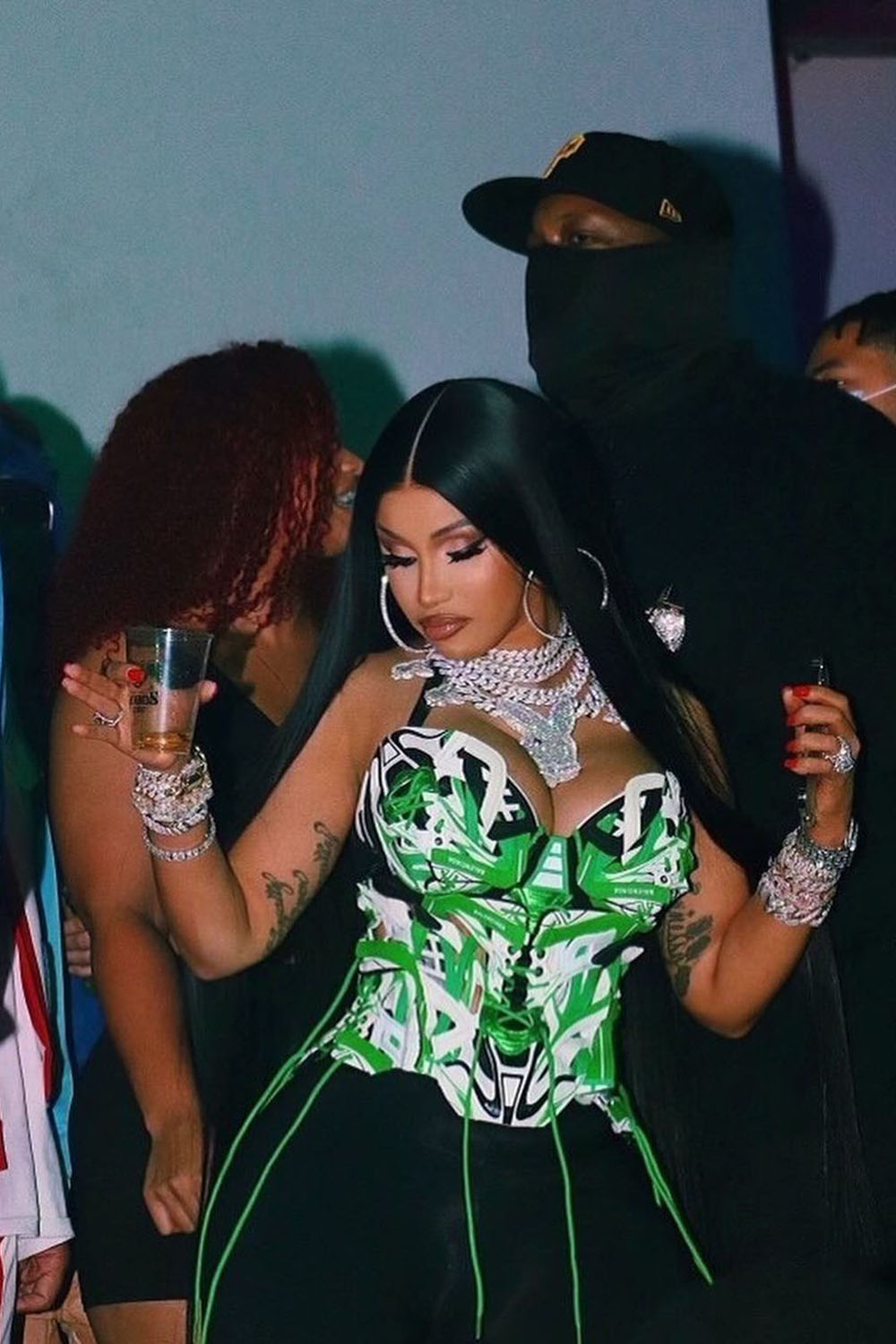 Cosert de tênis verde, Cardi B