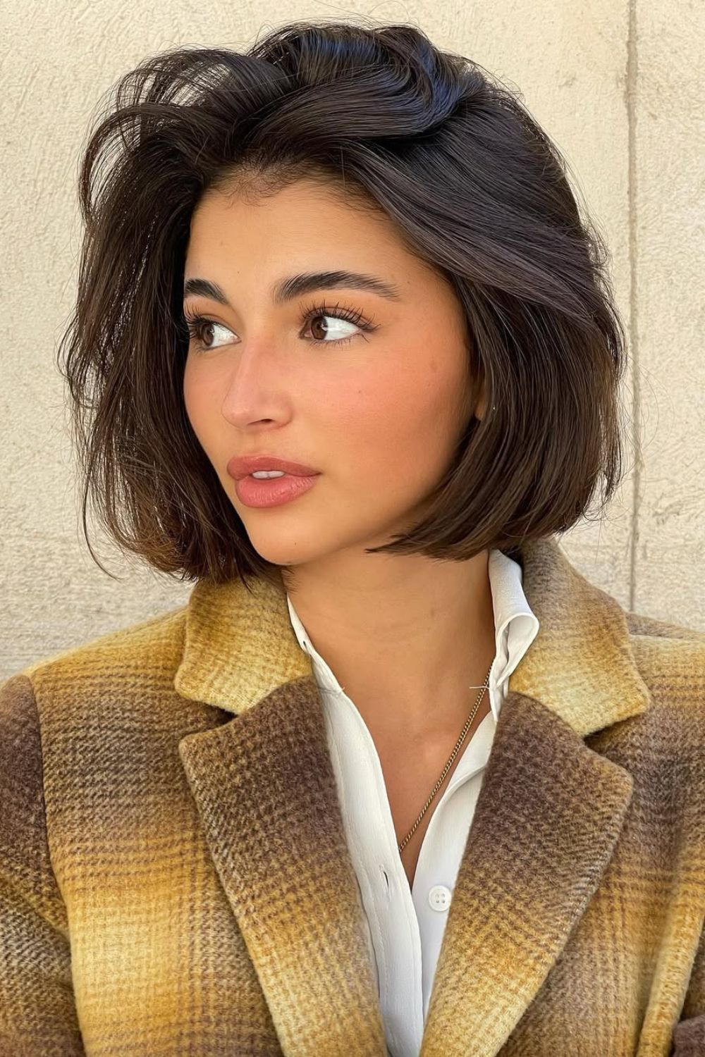 Corte chanel tradicional, corte bob no cabelo preto
