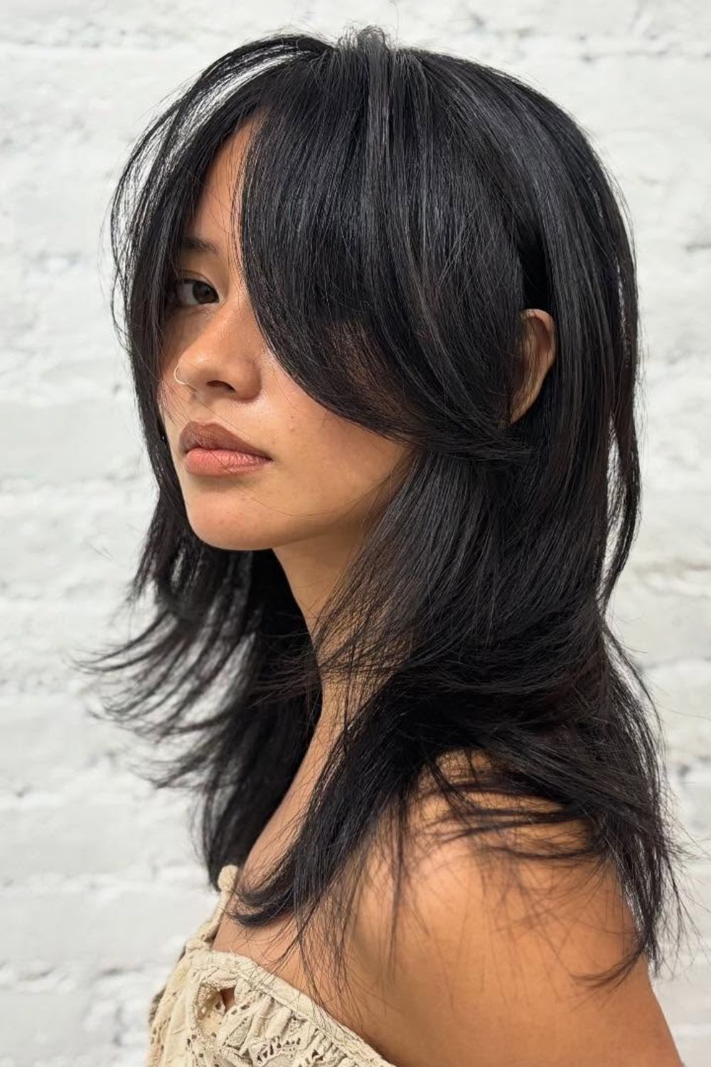 Shaggy hair no cabelo preto liso